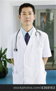 Portrait of a male doctor standing