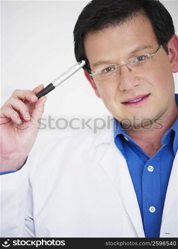 Portrait of a male doctor thinking
