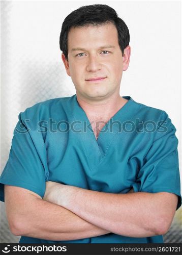 Portrait of a male doctor with his arms crossed
