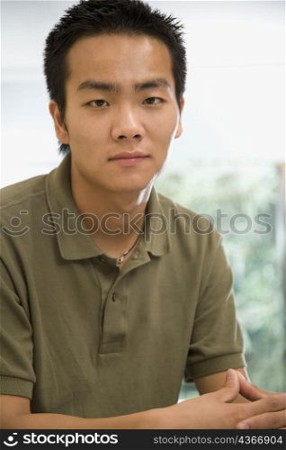 Portrait of a male office worker looking serious