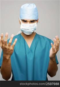 Portrait of a male surgeon wearing a surgical mask