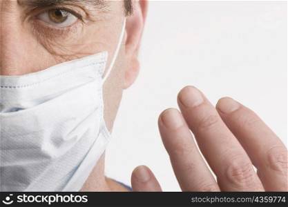 Portrait of a male surgeon wearing surgical mask