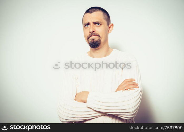 Portrait of a man arms folded