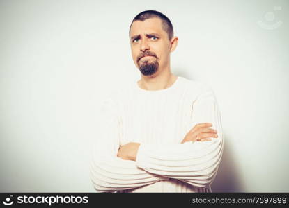 Portrait of a man arms folded