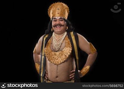 Portrait of a man dressed as Raavan smiling