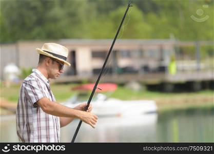 portrait of a man fishing