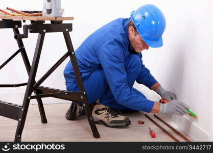 portrait of a man taking measures