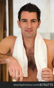 Portrait of a man with bath towel