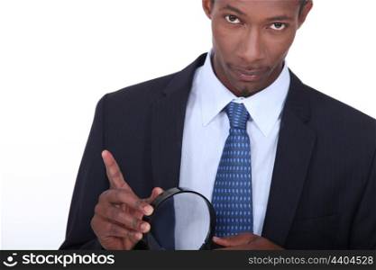 portrait of a man with magnifying glass