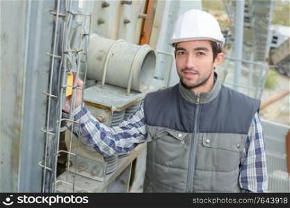 portrait of a masonry worker on site