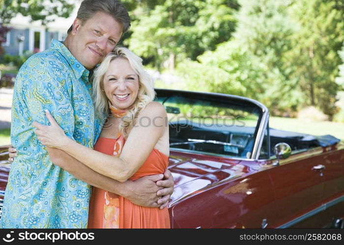 Portrait of a mature couple embracing each other and smiling