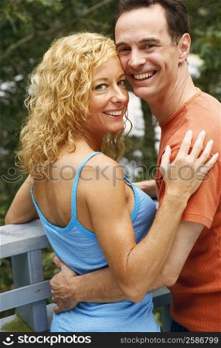 Portrait of a mature couple embracing each other and smiling