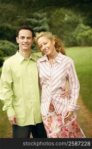 Portrait of a mature couple standing and smiling