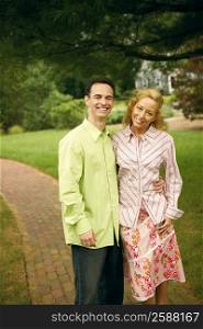Portrait of a mature couple standing and smiling