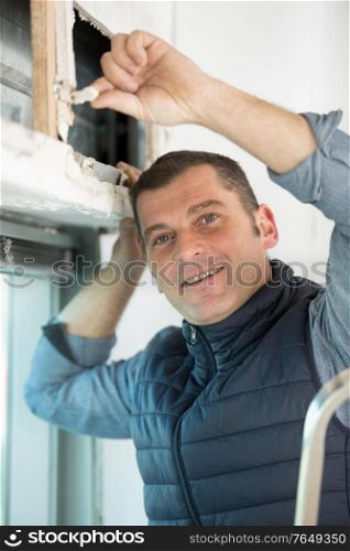 portrait of a mature male builder