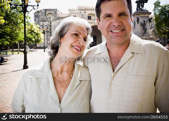 Portrait of a mature man and his mother looking at him and smiling, Santo Domingo, Dominican Republic