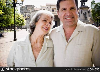 Portrait of a mature man and his mother looking at him and smiling, Santo Domingo, Dominican Republic