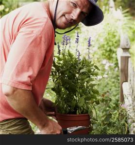 Portrait of a mature man gardening
