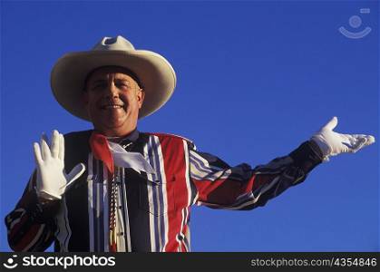 Portrait of a mature man gesturing, Texas, USA