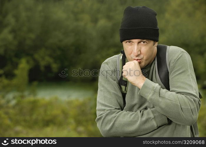 Portrait of a mature man shivering