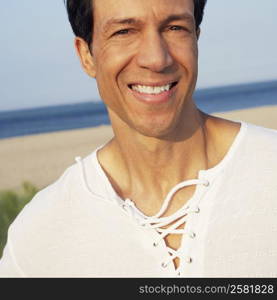 Portrait of a mature man smiling on the beach