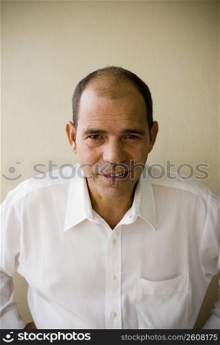 Portrait of a mature man smirking