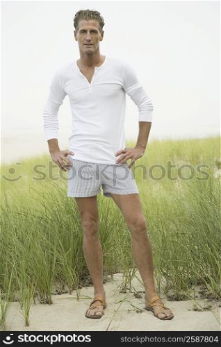 Portrait of a mature man standing on the beach