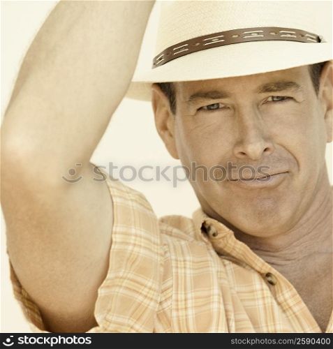 Portrait of a mature man wearing a hat