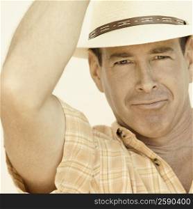 Portrait of a mature man wearing a hat