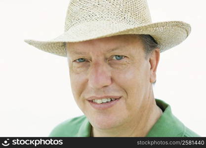 Portrait of a mature man wearing a hat and smiling