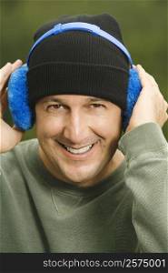 Portrait of a mature man wearing headphones