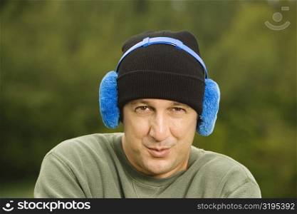 Portrait of a mature man wearing headphones