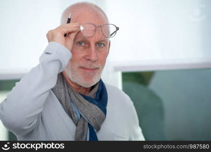 portrait of a mature man with glasses