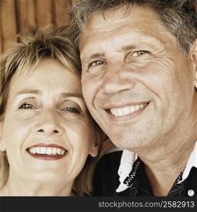 Portrait of a mature woman and a senior man smiling