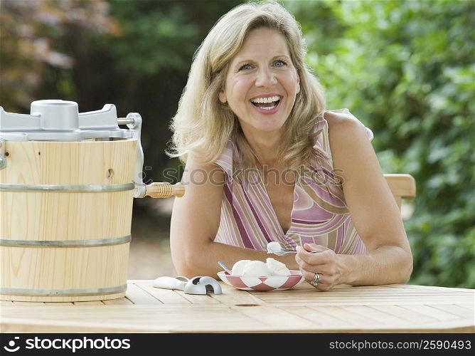 Portrait of a mature woman eating an ice cream