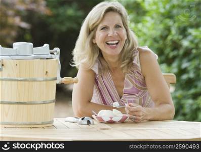 Portrait of a mature woman eating an ice cream