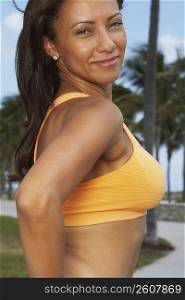 Portrait of a mature woman grinning, South Beach, Miami Beach, Florida, USA