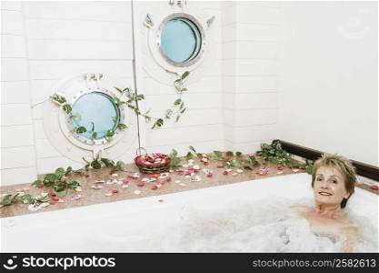 Portrait of a mature woman in a bathtub