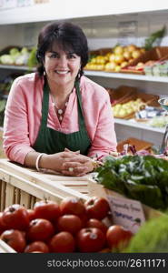 Portrait of a mature woman in a store and smiling