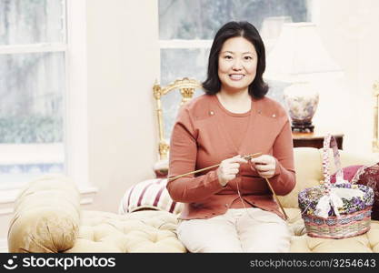 Portrait of a mature woman knitting