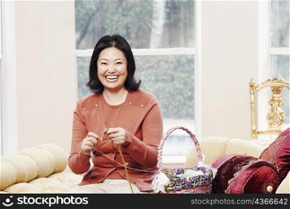 Portrait of a mature woman knitting