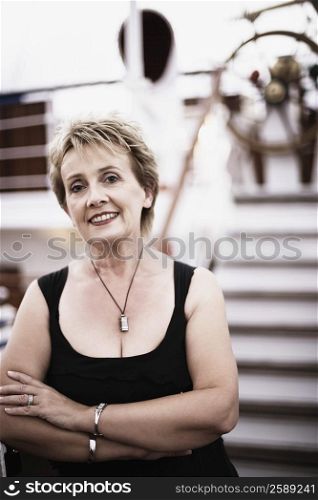 Portrait of a mature woman on a sailing ship and smiling