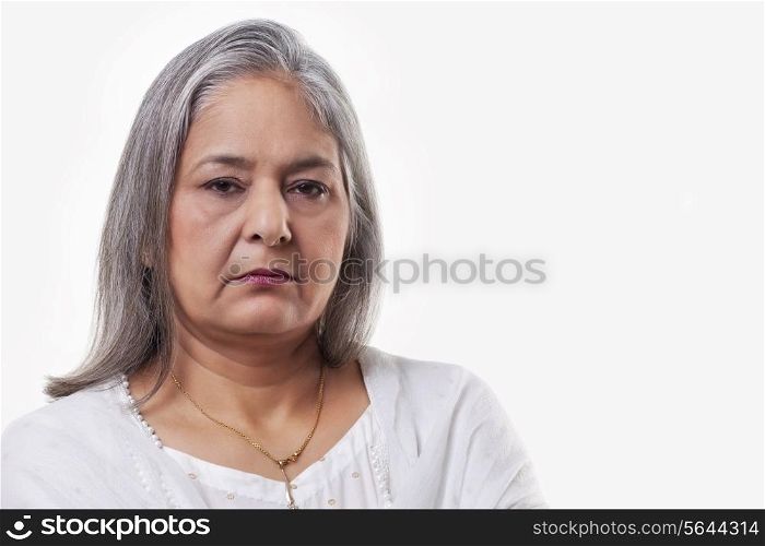 Portrait of a mature woman over white background