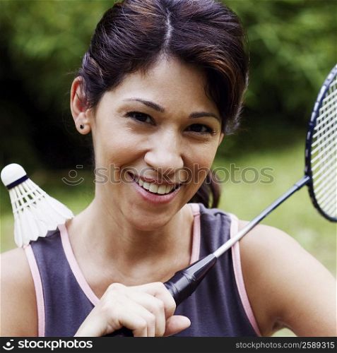 Portrait of a mature woman playing badminton