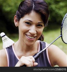 Portrait of a mature woman playing badminton