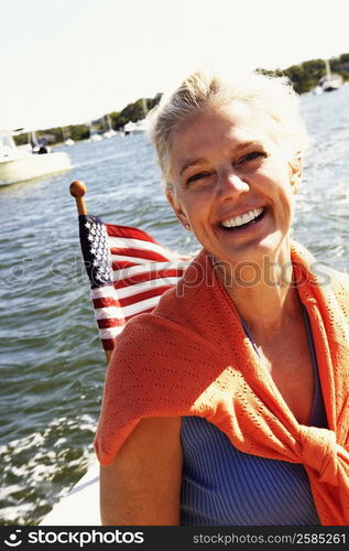 Portrait of a mature woman smiling in a boat