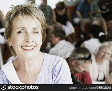 Portrait of a mature woman smiling in a ferry