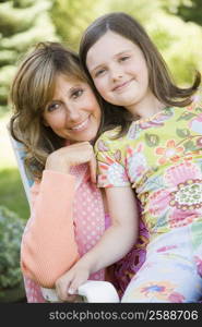 Portrait of a mature woman smiling with her daughter