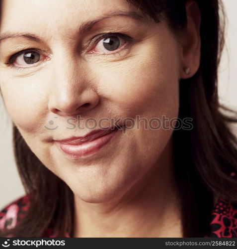 Portrait of a mature woman smirking