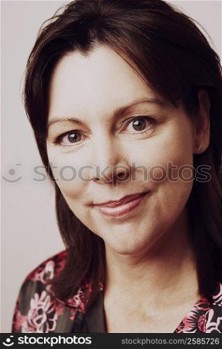 Portrait of a mature woman smirking